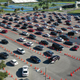 Cars line up at a drive through covid-19 testing site at Tropical Park on December 22, 2021 in Miami, Florida